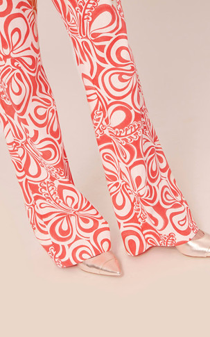 Pantalon fluide imprimé fleuri corail